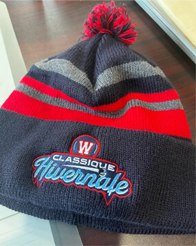 Embroidery of Classique hivernale logo on a toque