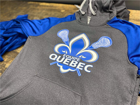 Screen printing on Equipe Quebec promotional clothing